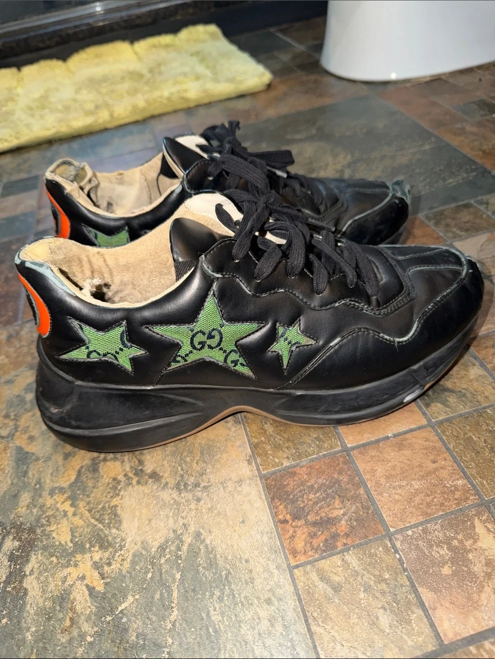 Black Leather Gucci Sneakers with Green Star Accents